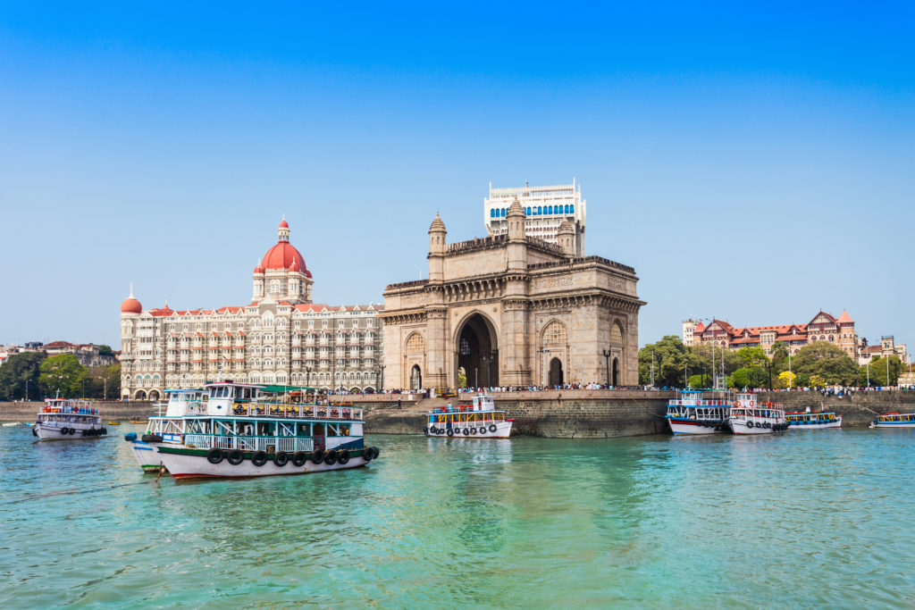 The Gateway of India and boats as seen from the Mumbai Harbour in Mumbai, India