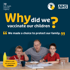 Image of a European father from London and sons doing homework telling us they got vaccinated to protect their family. 