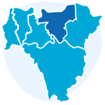 Icon representing a map of the six Boroughs of south east London, with five Boroughs in light blue and Greenwich coloured in dark blue. Behind the map, a circle in lighter blue