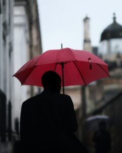 man holding umbrella