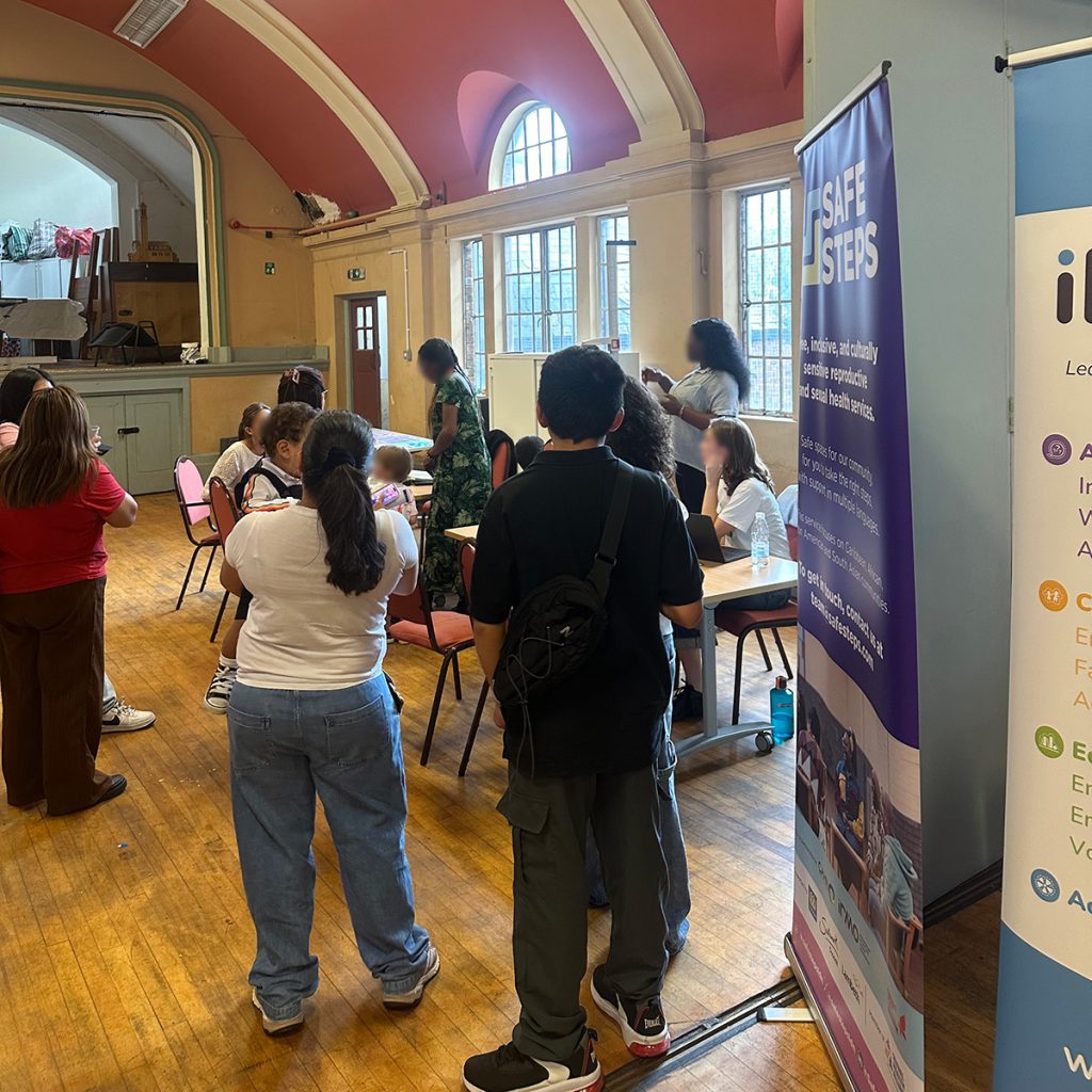 Lewisham residents speak with health and community organisations at the event organised by IRMO at St Saviour’s Catholic Church